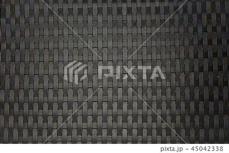 Dark brown rattan wicker texture or background. Dark brown rattan wicker texture or background. 45042338