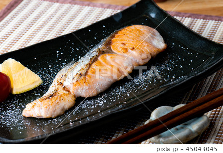 Salmon grilled with salt in Japanese style . 45043045