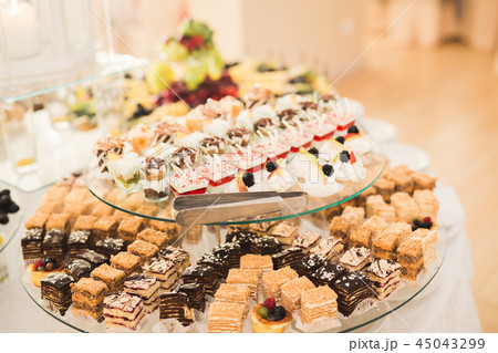 Different kinds of baked sweets on a buffet 45043299