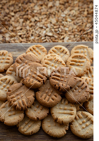 Freshly baked peanut butter cookies on cooling rack. Macro with extremely shallow dof Freshly baked peanut butter cookies on cooling rack. Macro with extremely shallow dof 45044874