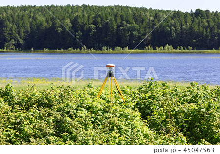 Geodetic GNSS receiver installed on the river bank works autonomously 45047563