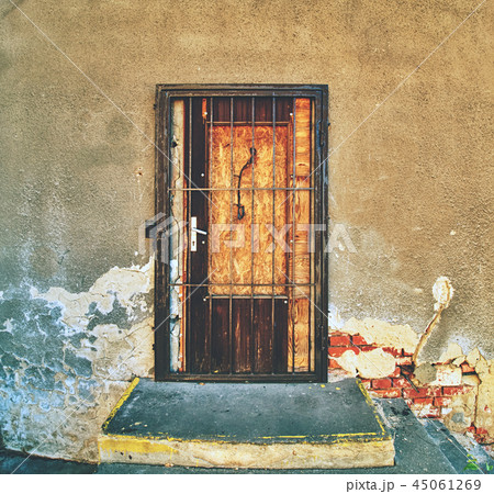 Walled door entry of abandoned house. Walled door entry of abandoned house. 45061269