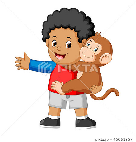 a little boy holding a funny monkey 45061357