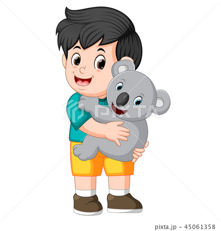 a little boy holding koala 45061358