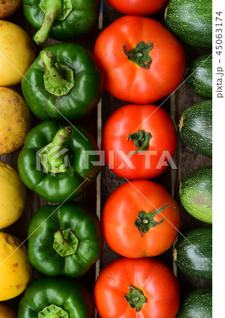Cucumbers, tomatoes and sweet pepper  45063174