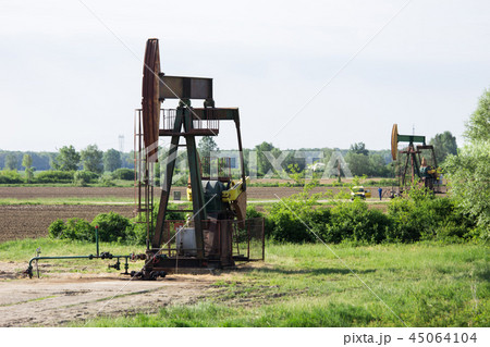 Oil rigs work in the field Oil rigs work in the field 45064104