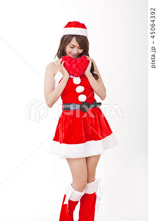 女性 クリスマス サンタの写真素材