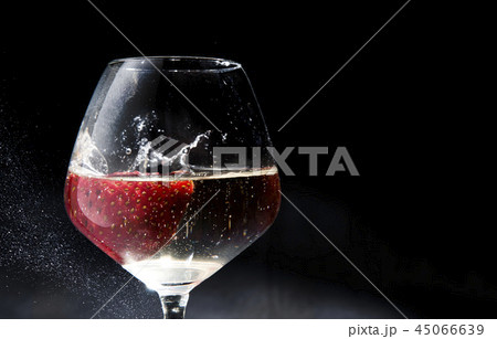 Strawberries put in white wine glass Strawberries put in white wine glass 45066639
