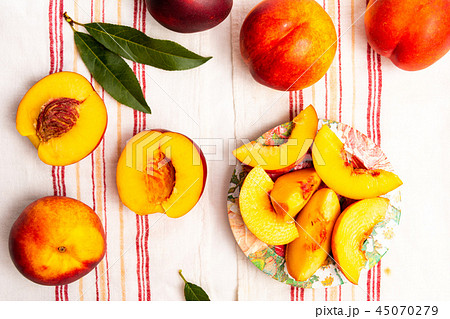 Fresh peach on a table top view 45070279