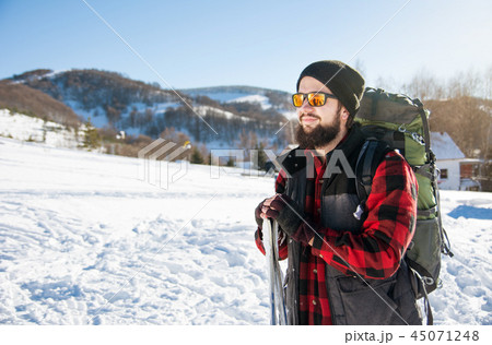 Man with skis outdoors Man with skis outdoors 45071248