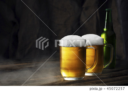 Glass of beer on a dark background Glass of beer on a dark background 45072257