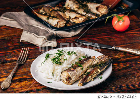 Baked hake carcasses with rice 45072337
