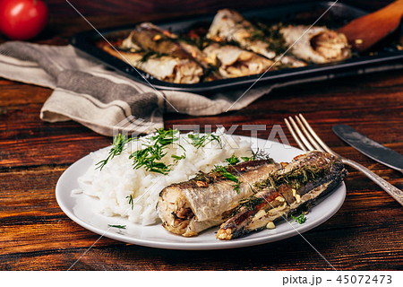 Baked hake carcasses with rice 45072473