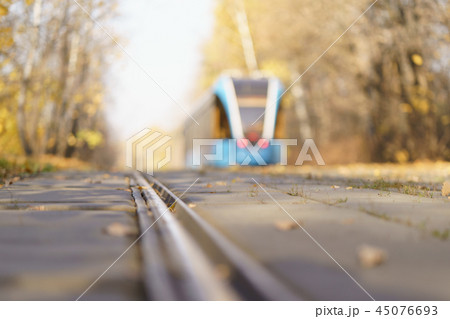Tram at the city street at the sunny autumn day 45076693