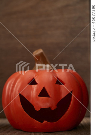 Autumn a pumpkin on wooden background 45077290