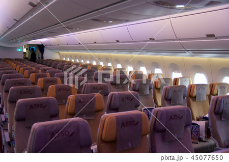 DUSSELDORF - JULY 22, 2016: Singapore Airlines Economy Class on board of Airbus A350 45077650