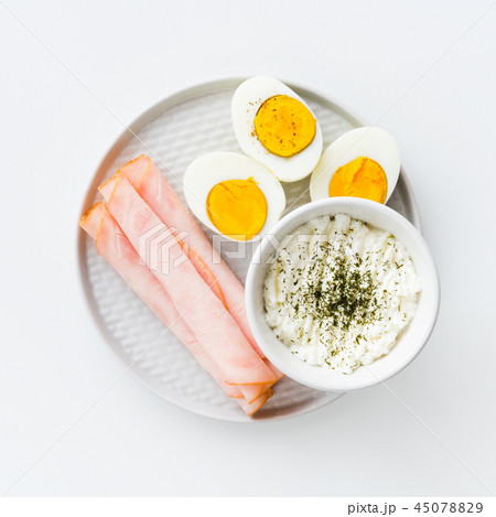 Healthy breakfast. Boiled eggs, ham and cheese Healthy breakfast. Boiled eggs, ham and cheese 45078829