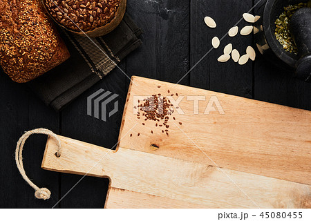 Chopping board and various whole wheat bread 45080455