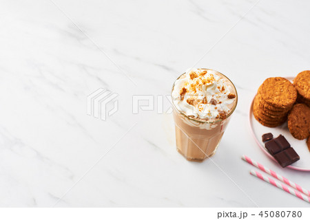 Chocolate ice coffee with whipped cream and cookie Chocolate ice coffee with whipped cream and cookie 45080780