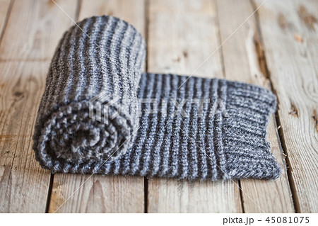 Hand knitted gray scarf. Hand knitted gray scarf. 45081075