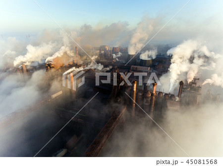 Industrial city of Mariupol, Ukraine, in the smoke of industrial plants and fog at dawn. Industrial city of Mariupol, Ukraine, in the smoke of industrial plants and fog at dawn. 45081568