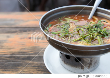 hot Curry orange soup with fish and Mesmerize hot Curry orange soup with fish and Mesmerize 45084368