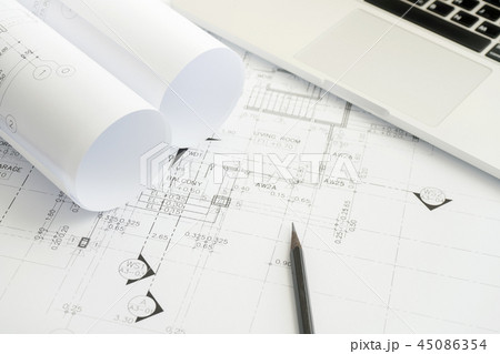 pencil and laptop on architectural drawing paper 45086354