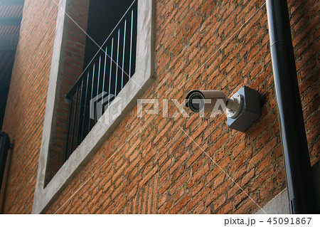 CCTV security camera with brick building CCTV security camera with brick building 45091867