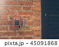 Fire alarm on the brick wall 45091868