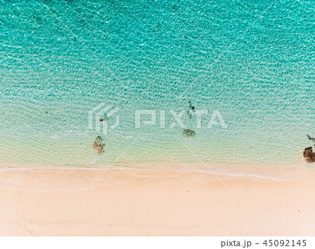 Top view of paradise beach with turquoise ocean Top view of paradise beach with turquoise ocean 45092145