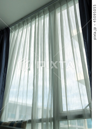 Light from the back of a thin white curtain Light from the back of a thin white curtain 45095055