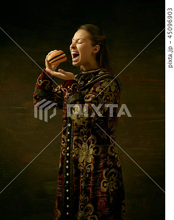 Girl standing in Russian traditional costume. 45096903