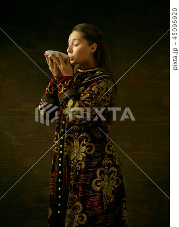 Girl standing in Russian traditional costume. 45096920