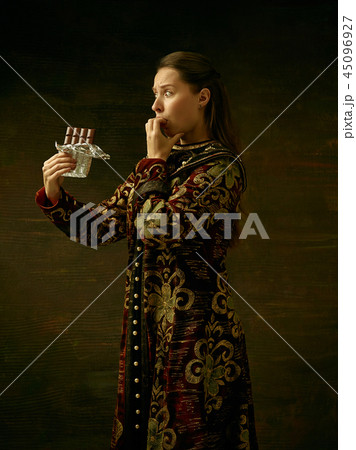 Girl standing in Russian traditional costume. 45096927