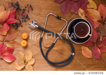 autumn disease medicine red berries yellow leaves 45098508