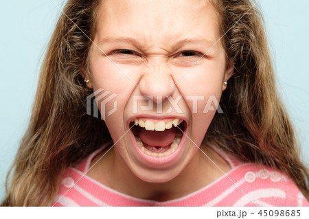 angry cross irritated girl screaming emotion 45098685
