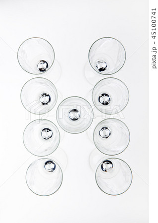 alphabet Empty champagne glass white background  45100741