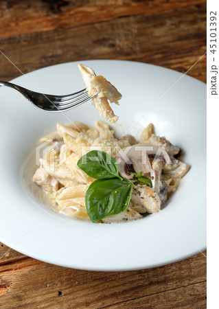 Fork with pasta 45101392