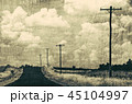Retro grunge textured black and white country road 45104997
