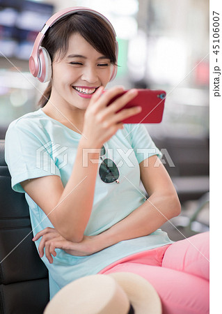 woman use phone listen music woman use phone listen music 45106007