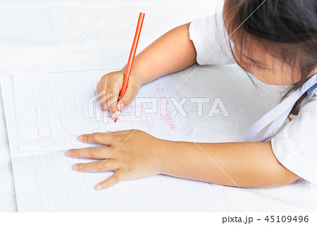 little girl writes to writing-books 45109496