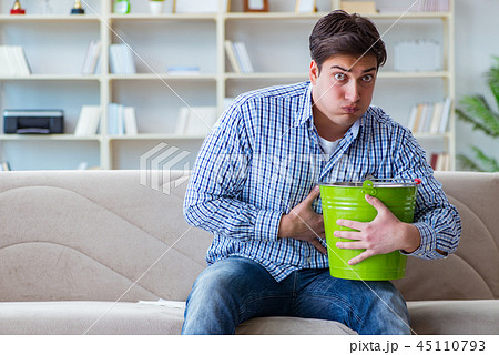 Sick man suffering at home from infection and bad stomach 45110793