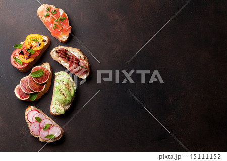 Brushetta or traditional spanish tapas Brushetta or traditional spanish tapas 45111152