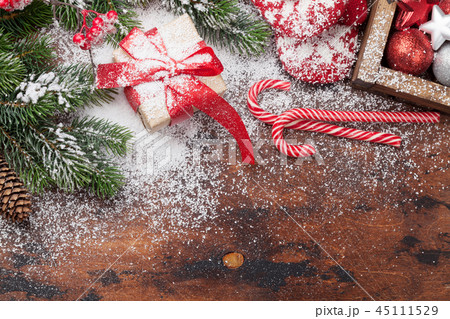 Christmas gift box and fir tree Christmas gift box and fir tree 45111529