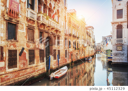 Gondolas on canal in Venice. is a popular tourist destination of Europe Gondolas on canal in Venice. is a popular tourist destination of Europe 45112329