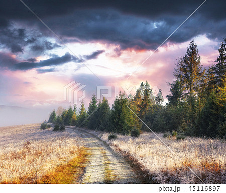 October mountain range in the first winter days. Road to hoarfro 45116897