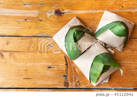 Simple authentic nasi lemak banana leaf breakfast 45122042