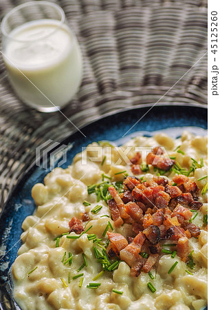 potato dumplings with sheep cheese and bacon 45125260