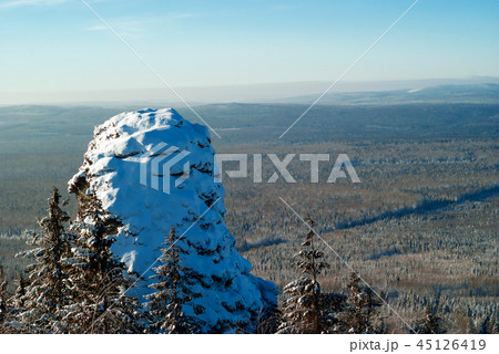 snow covered rock in a winter landscape 45126419