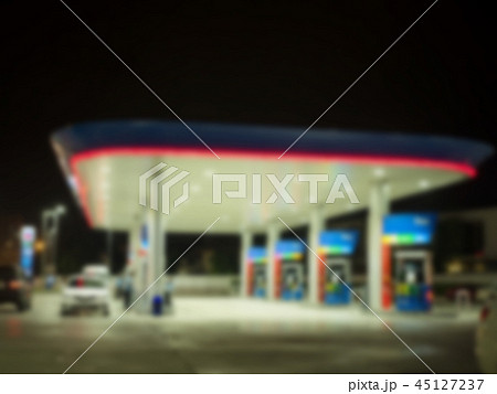 Blur gas station at night twilight. Blur gas station at night twilight. 45127237